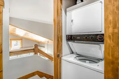 a bathroom with a toilet in a tiny house at Alpine Holidays Ski Tip in Keystone