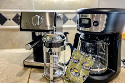 a coffee maker sitting on top of a counter at Alpine Holidays Ski Tip in Keystone