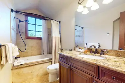 a bathroom with a sink and a toilet and a shower at Moose Whiskers in Keystone