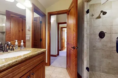 a bathroom with a sink and a shower at Moose Whiskers in Keystone