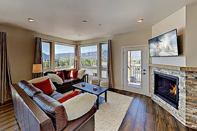 a living room with a couch and a fireplace at La Bonte Townhomes Unit 304 in Dillon