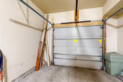 a garage with a metal garage door in a room at Northstar Townhome Unit 1968 in Keystone