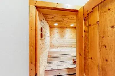 a wooden sauna in a house at Fairy Tale House in Dillon
