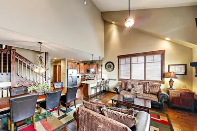 a living room with a couch and a table at Buffalo Lodge Townhomes 1293 in Silverthorne