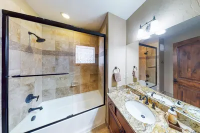 a bathroom with a sink and a shower at Buffalo Lodge Townhomes 1293 in Silverthorne