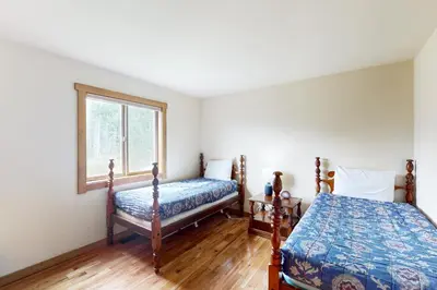 a bedroom with two beds and a window at Ski Your Heart Out in Silverthorne