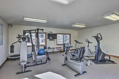 a gym with several treadmills and exercise bikes at Frisco Condo with Balcony 7 Mi to Copper Mountain! in Frisco