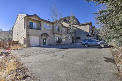 a car parked in front of a house at Frisco Condo with Balcony 7 Mi to Copper Mountain! in Frisco
