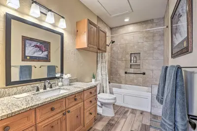 a bathroom with a sink and a toilet and a tub at Frisco Condo with Balcony 7 Mi to Copper Mountain! in Frisco