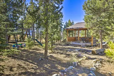 a gazebo in the woods with a playground at 6 Mi to Keystone Ski! Mtn-View Cabin with Game Room in Silverthorne