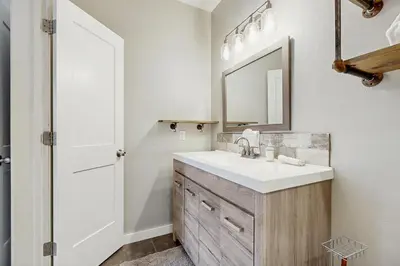 a bathroom with a sink and a mirror at Take the Mountain View in Silverthorne