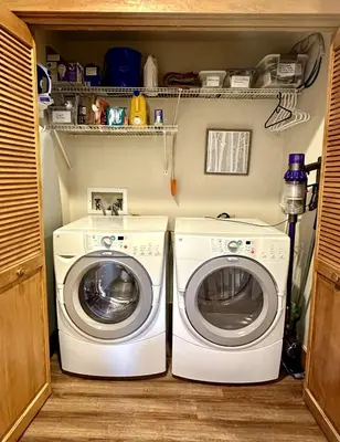 a washing machine and a washer in a kitchen at 2348 Red Hawk Townhomes condo in Keystone