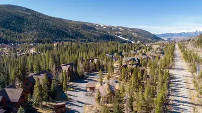 an aerial view of a village in the mountains at 8767 Trappers Crossing condo in Keystone