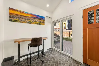 a home office with a desk and a window at Vibrant Downtown Bungalow - Walk Everywhere! in Fort Collins