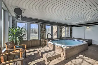 a large jacuzzi tub in the middle of a room at 6 Mi to Slopes! Mtn-View Breck Gem with Resort Perks in Breckenridge