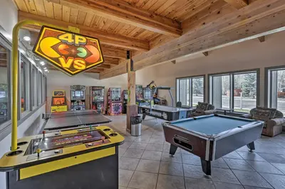 a room with a pool table and ping pong balls at 6 Mi to Slopes! Mtn-View Breck Gem with Resort Perks in Breckenridge