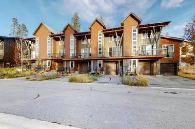 a large apartment building with a street in front of it at Fraser Fantasy in Fraser