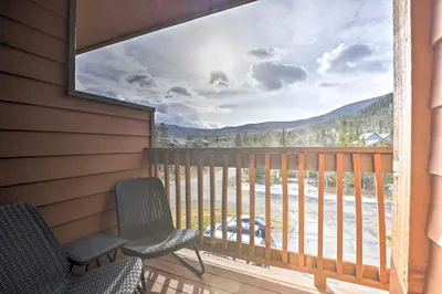 a balcony with two chairs and a view of the mountains at Walk to Main St Frisco! Modern Unit 7 Mi to Slopes in Frisco