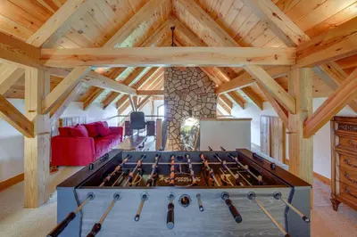 a large room with a table with wine bottles at 7 Mi to Rocky Mtn Natl Park Grand Lake Home! in Grand Lake