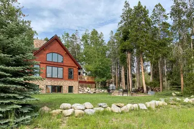 a man standing in front of a house at 7 Mi to Rocky Mtn Natl Park Grand Lake Home! in Grand Lake