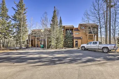a truck parked in front of a building at Hot Tub and Mtn Views Silverthorne Escape! in Silverthorne