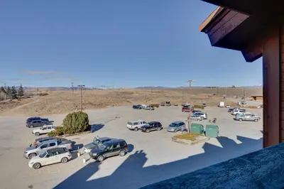 an overhead view of a parking lot with cars parked at 2 Mi to Granby Ranch Resort Studio with Pool Access in Granby