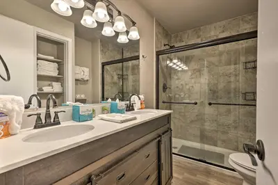 a bathroom with a sink and a shower at 2 Mi to Skiing Studio with Pool Access in Granby! in Granby