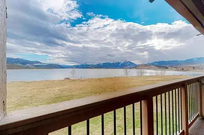 a view of a lake from the balcony of a house at Lakeside Mountain Retreat in Dillon