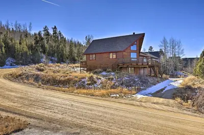 a house on the side of a dirt road at 1 Mi to Granby Ranch Family-Friendly Cabin! in Granby