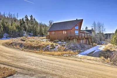 a house on the side of a dirt road at 1 Mi to Granby Ranch Family-Friendly Cabin! in Granby