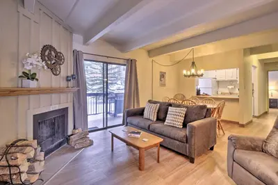 a living room with a couch and a fireplace at 1 Mi to Dillon Reservoir Condo Retreat in Frisco! in Frisco