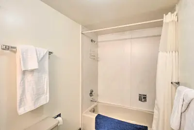 a bathroom with a shower and a toilet at 7 Mi to Keystone Resort Condo with Hot Tub and Pool in Dillon