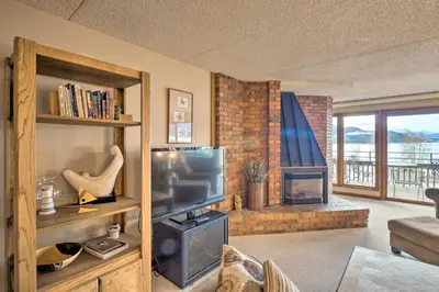a living room with a television and a fireplace at 7 Mi to Keystone Resort Condo with Hot Tub and Pool in Dillon
