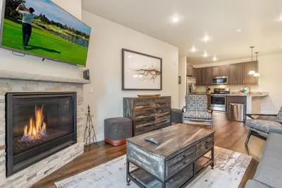 a living room with a fireplace and a tv at Sail Lofts at Lake Dillon 1107 in Dillon