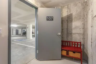 an open door in an office with a red bench at Sail Lofts at Lake Dillon 1107 in Dillon