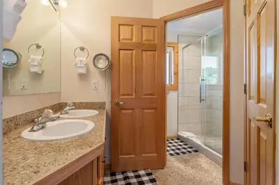a bathroom with a sink and a shower at Lake Ridge at Lake Dillon in Dillon