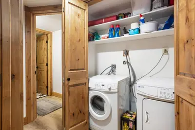 a laundry room with a washer and dryer at Wild Irishman 1027 - Keystone in Keystone