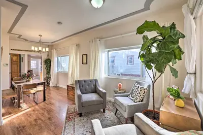 a living room with a couch and a chair at half Mi to Tennyson Pet-Friendly Denver Gem in Denver
