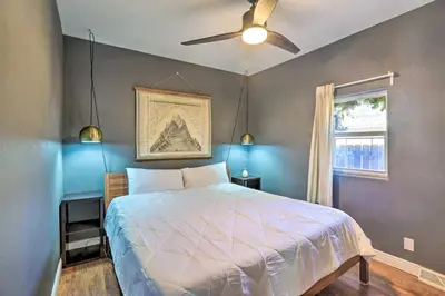 a bedroom with a bed and a ceiling fan at half Mi to Tennyson Pet-Friendly Denver Gem in Denver