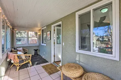 a home with a porch with a table and chairs at half Mi to Tennyson Pet-Friendly Denver Gem in Denver