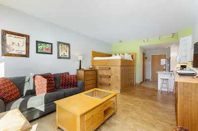 a living room with a couch and a table at 2754 Slopeside condo in Keystone