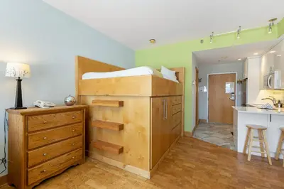 a bedroom with a bunk bed on top of a dresser at 2754 Slopeside condo in Keystone