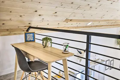 an office with a wooden desk and a chair at 1 Mi to St Marys Glacier Trail Modern Mtn Cabin! in Idaho Springs