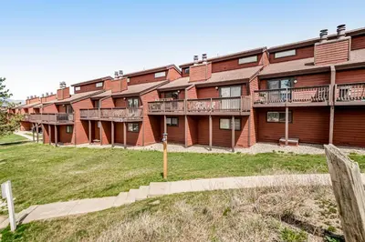 a row of apartment buildings with balconies at Fraser Family Getaway in Fraser