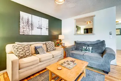 a living room with a couch and a chair at Walk to Main St Recently Renovated Frisco Condo in Frisco