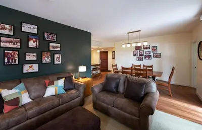 a living room with two couches and a dining room at Winter Park FF Premium Rated Condo 4340 in Winter Park