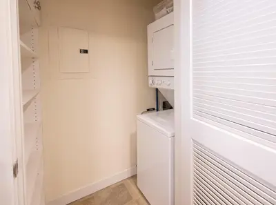 a white laundry room with a washer and dryer at Winter Park FF Premium Rated Condo 4340 in Winter Park