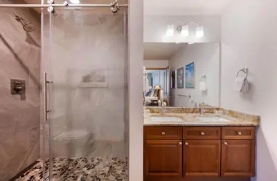 a bathroom with a shower and a sink at Zephyr Mountain Lodge Select-Rated 1602 in Winter Park
