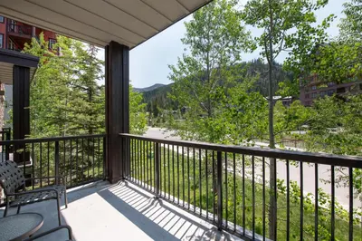 a balcony with a view of a street at Excellent townhome style condo - Close to the Gondola - Fraser Crossing Founder Pointe condo in Winter Park