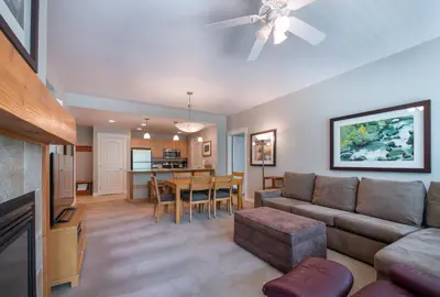 a living room with a couch and a table at Excellent townhome style condo - Close to the Gondola - Fraser Crossing Founder Pointe condo in Winter Park